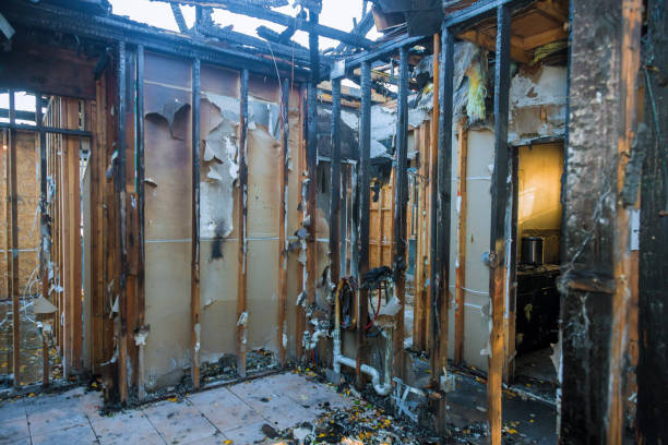 Professional Fire Damage Restoration technician working in Perryville, AR